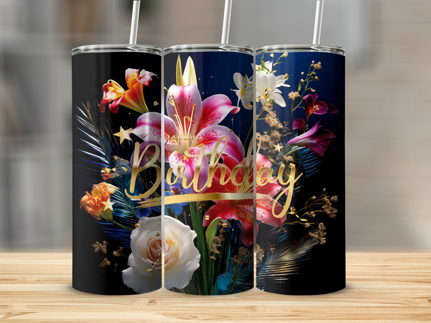 Birthday tumbler with colorful floral design and gold lettering.