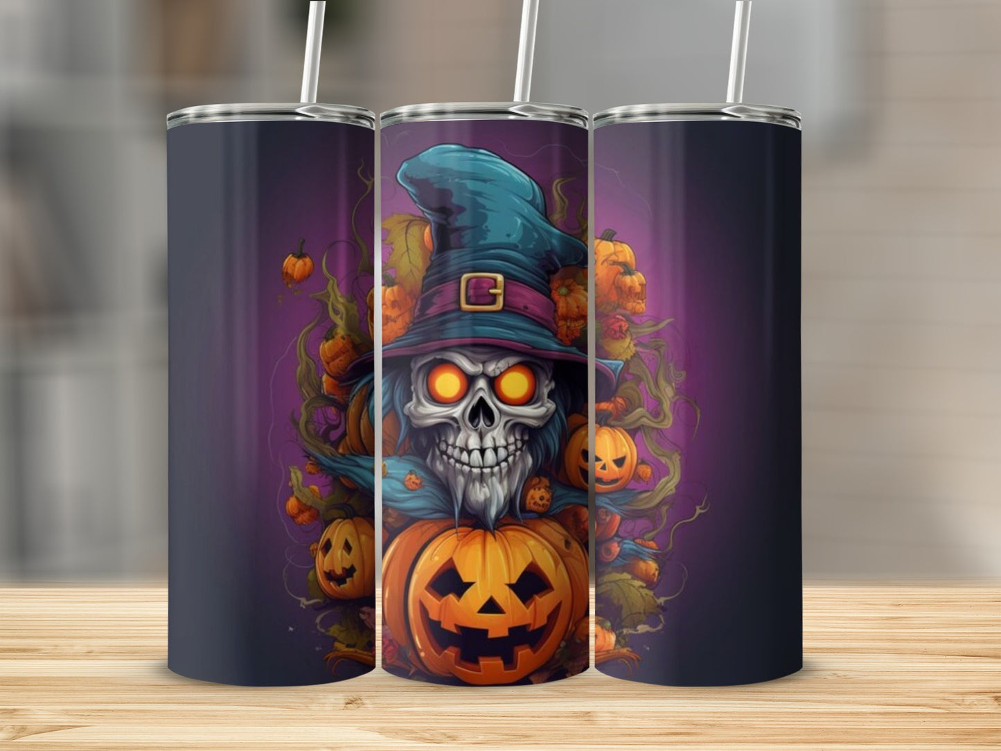 Three tumblers display a spooky Halloween design featuring a skeleton, pumpkins, and a witch hat.