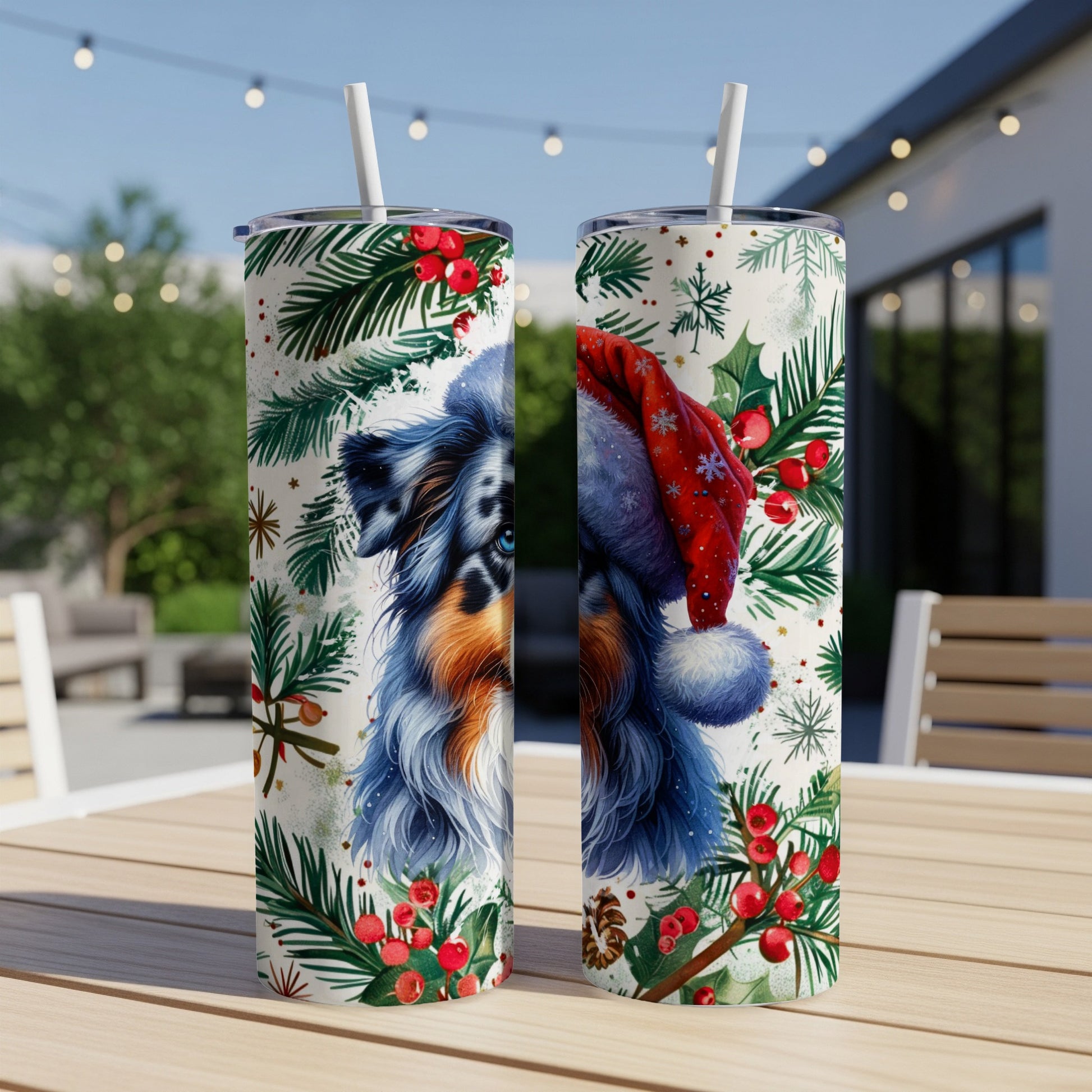 Christmas tumbler with blue merle Australian Shepherd and festive greenery design.