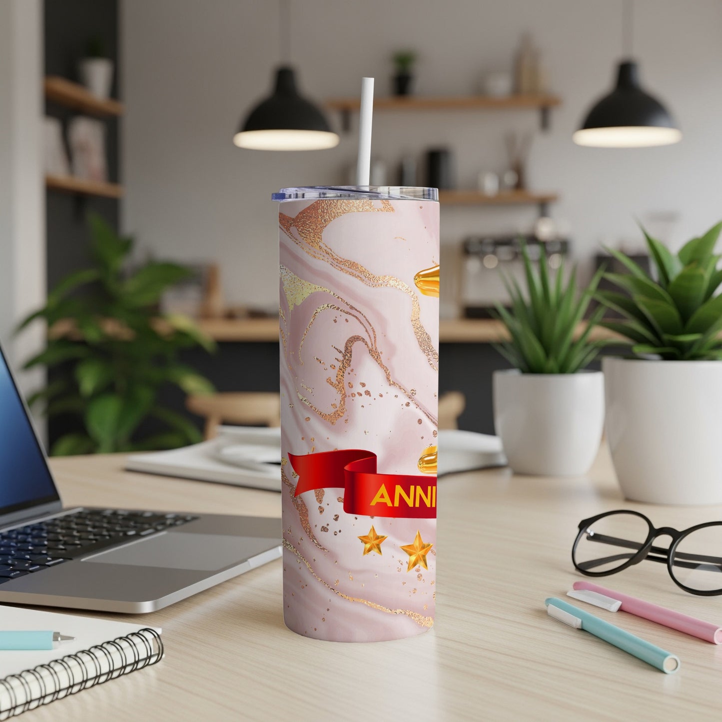 Pink marble tumbler with red ribbon and gold stars, "Anniversary" text.