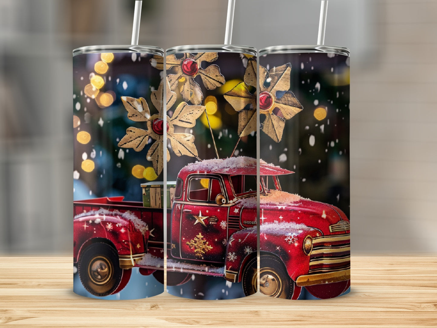 Three red vintage trucks decorated with snowflakes and golden stars.