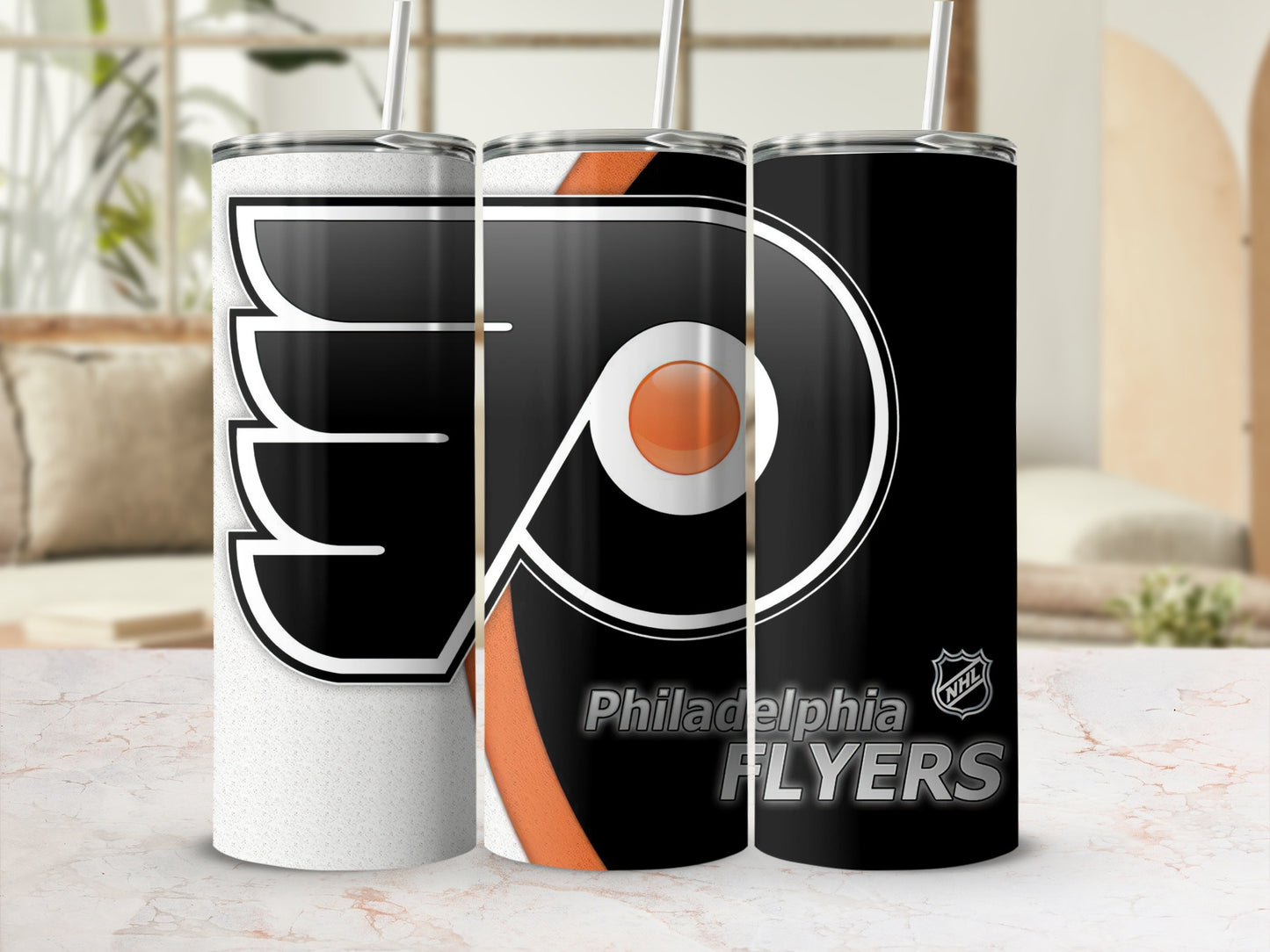 Philadelphia Flyers logo on three tall tumblers with straws.