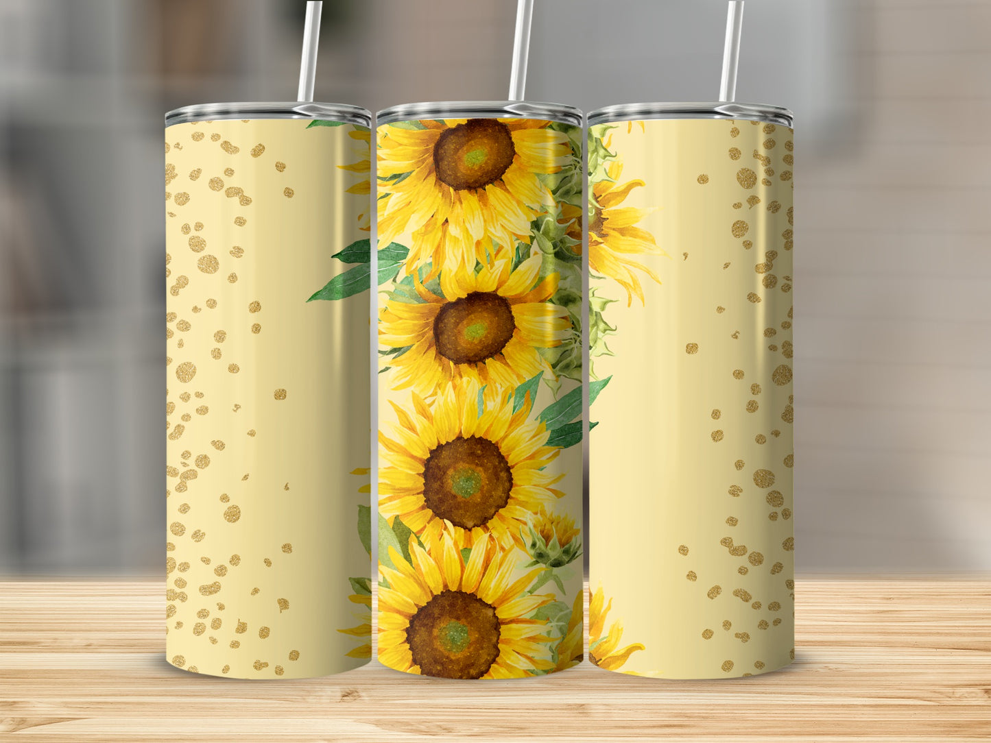 Sunflower pattern tumbler with gold glitter accents on a wooden surface.