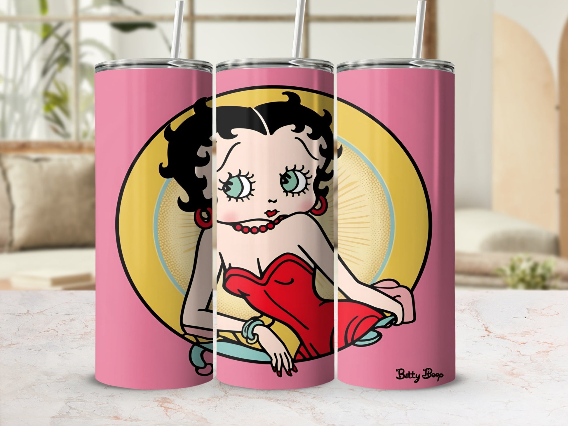 Betty Boop in red dress on pink tumbler with straw.