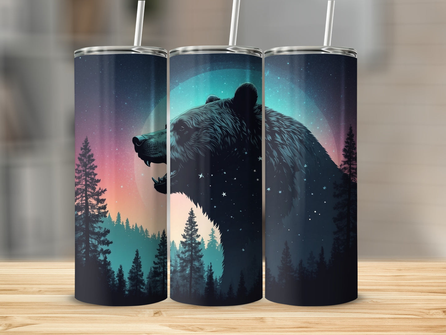 Tumbler with bear silhouette, starry night sky, and pine trees.