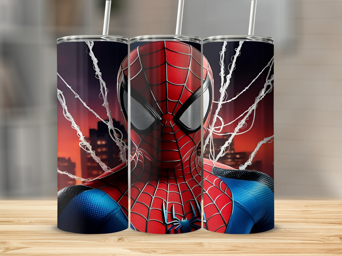 Spiderman character illustration on three tall tumblers against a city skyline background.