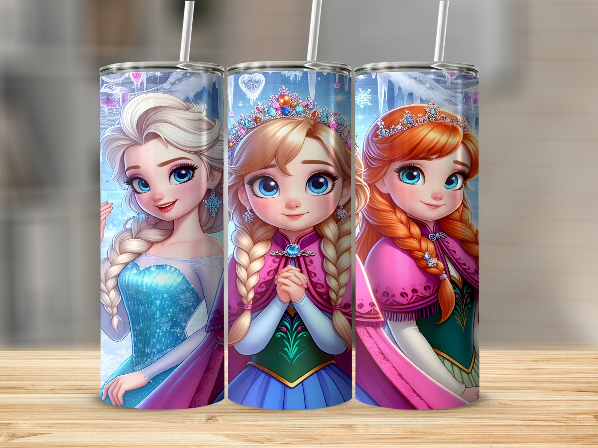 Elsa and Anna from Frozen in sparkly dresses and crowns on tumblers.