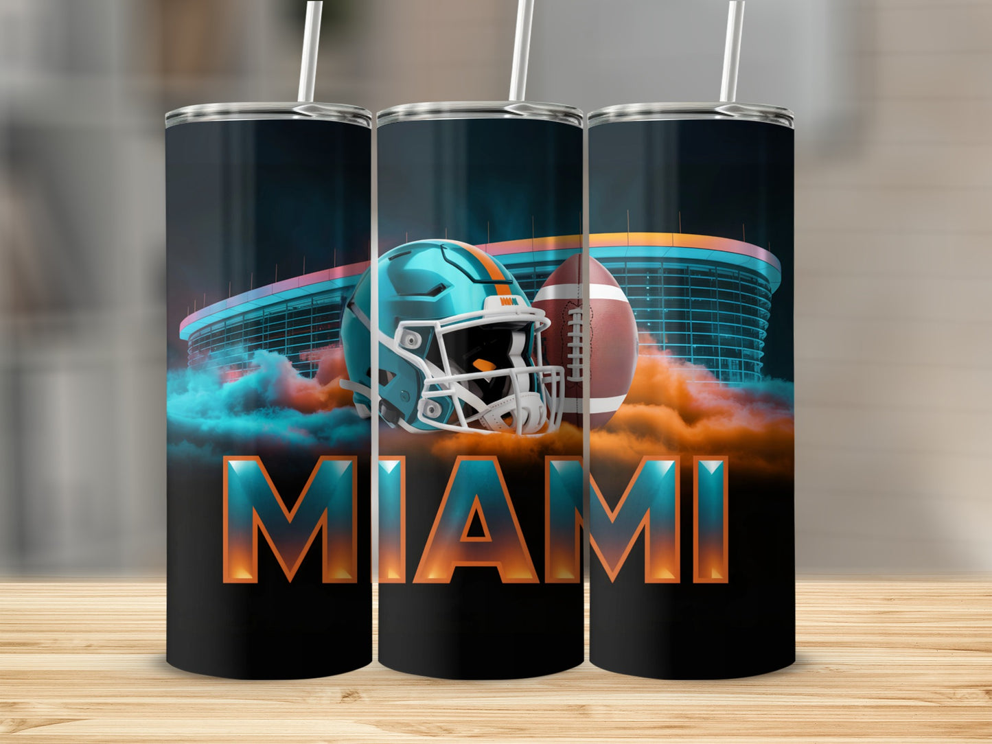 Miami Dolphins helmet and football against stadium backdrop.