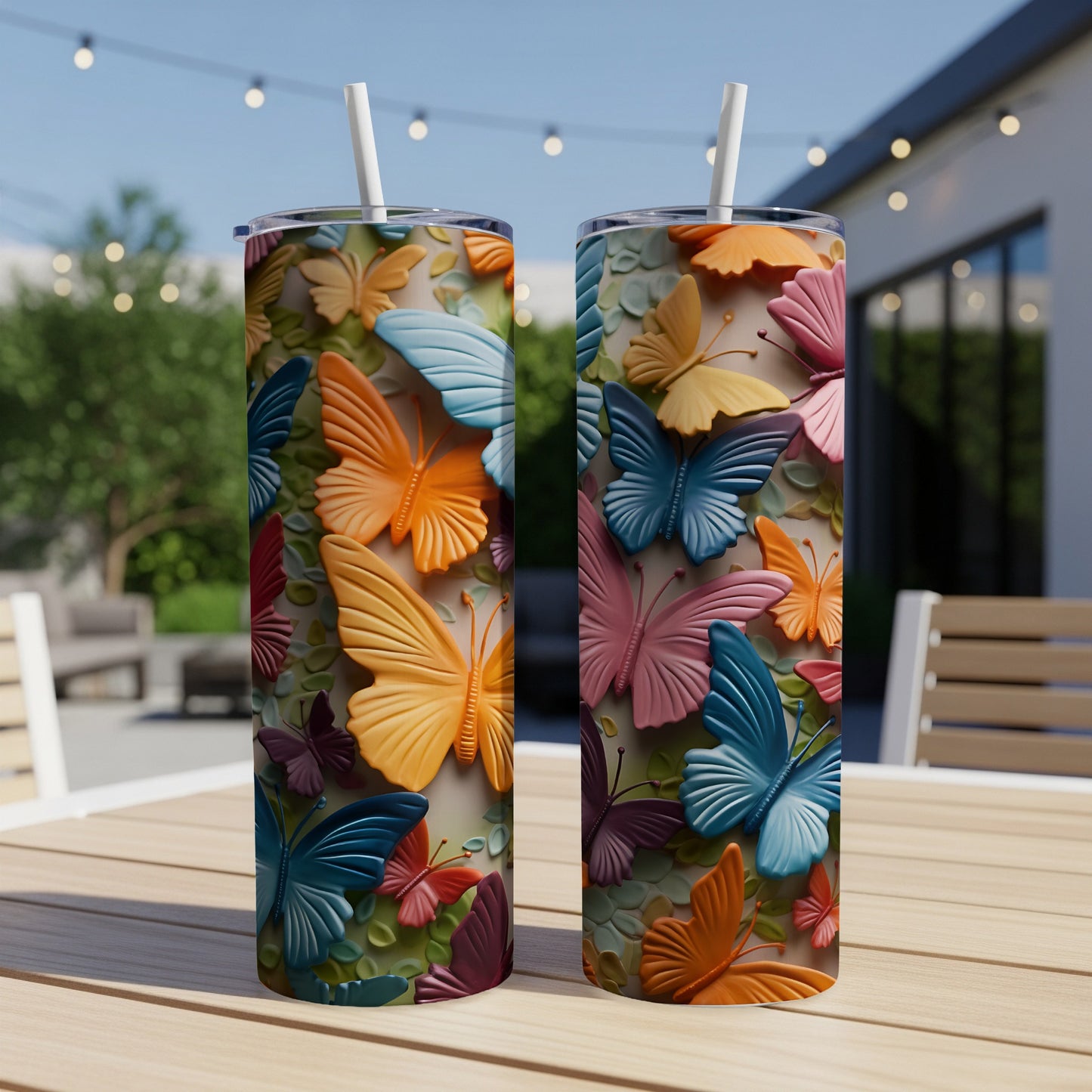 Two tumblers with raised butterfly designs in various bright colors.