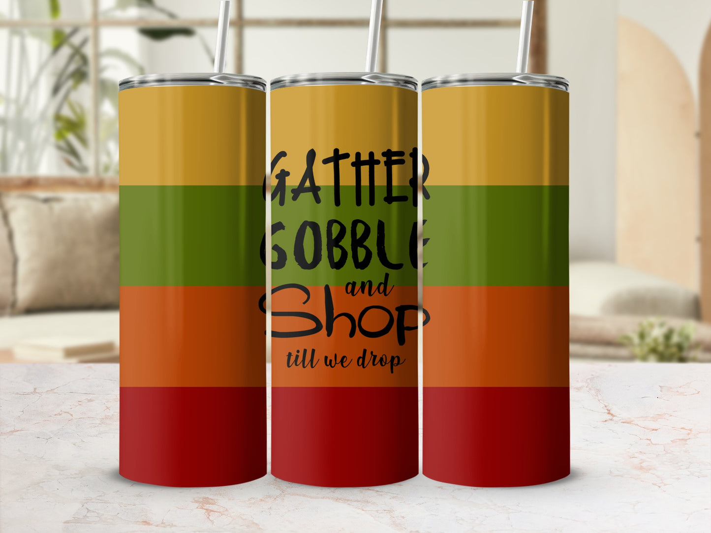 Three tumblers with "Gather Gobble and Shop till we drop" text on stripes.