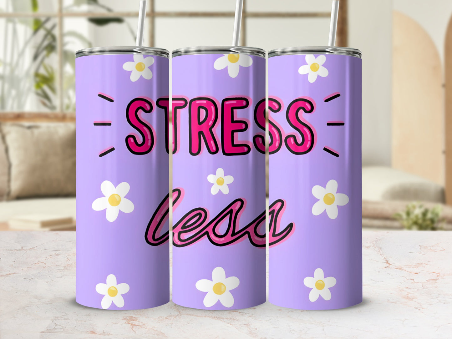Purple tumbler with "Stress Less" text and white daisies.