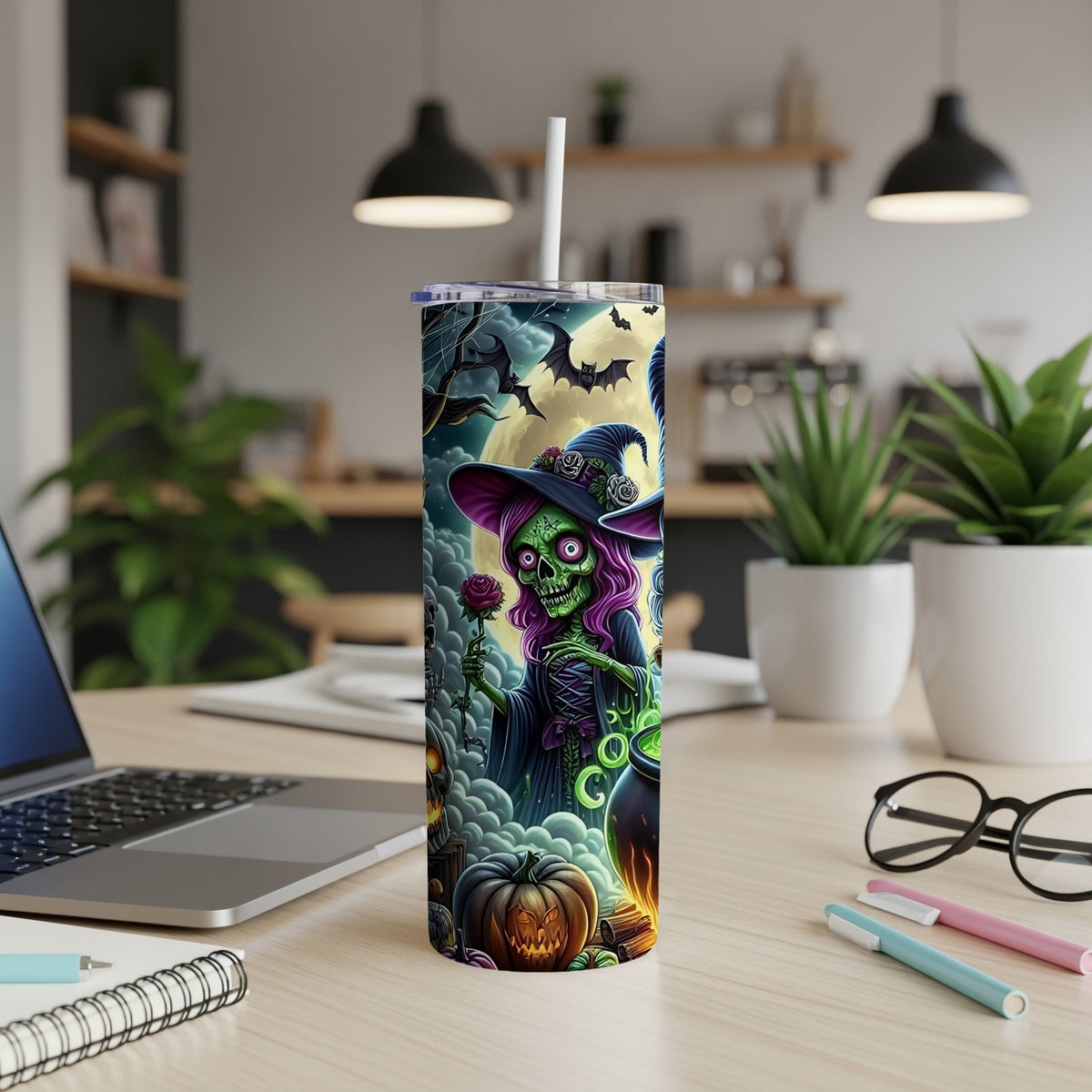 Tumbler with a green witch, bats, and pumpkins against a full moon.