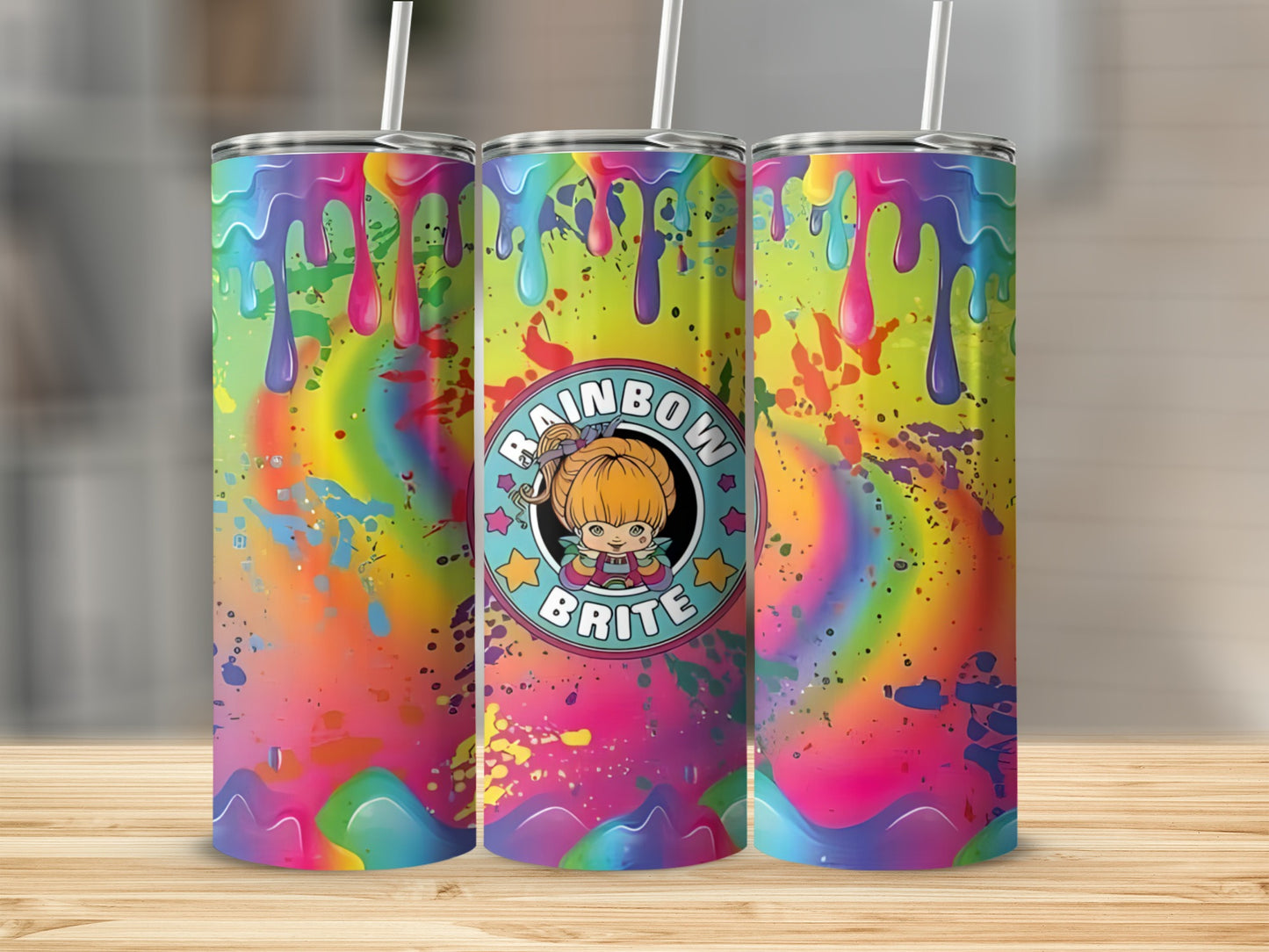 Rainbow Brite tumbler with dripping rainbow colors and splatter paint.