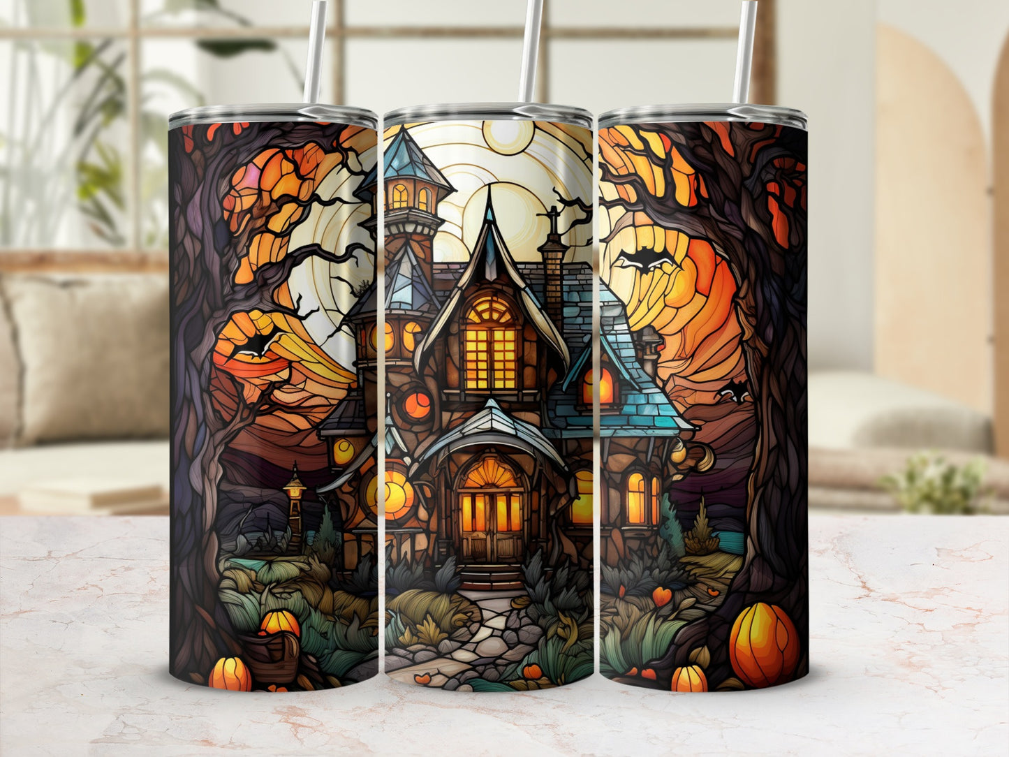 Halloween haunted house with stained glass windows and pumpkin details on a tumbler.