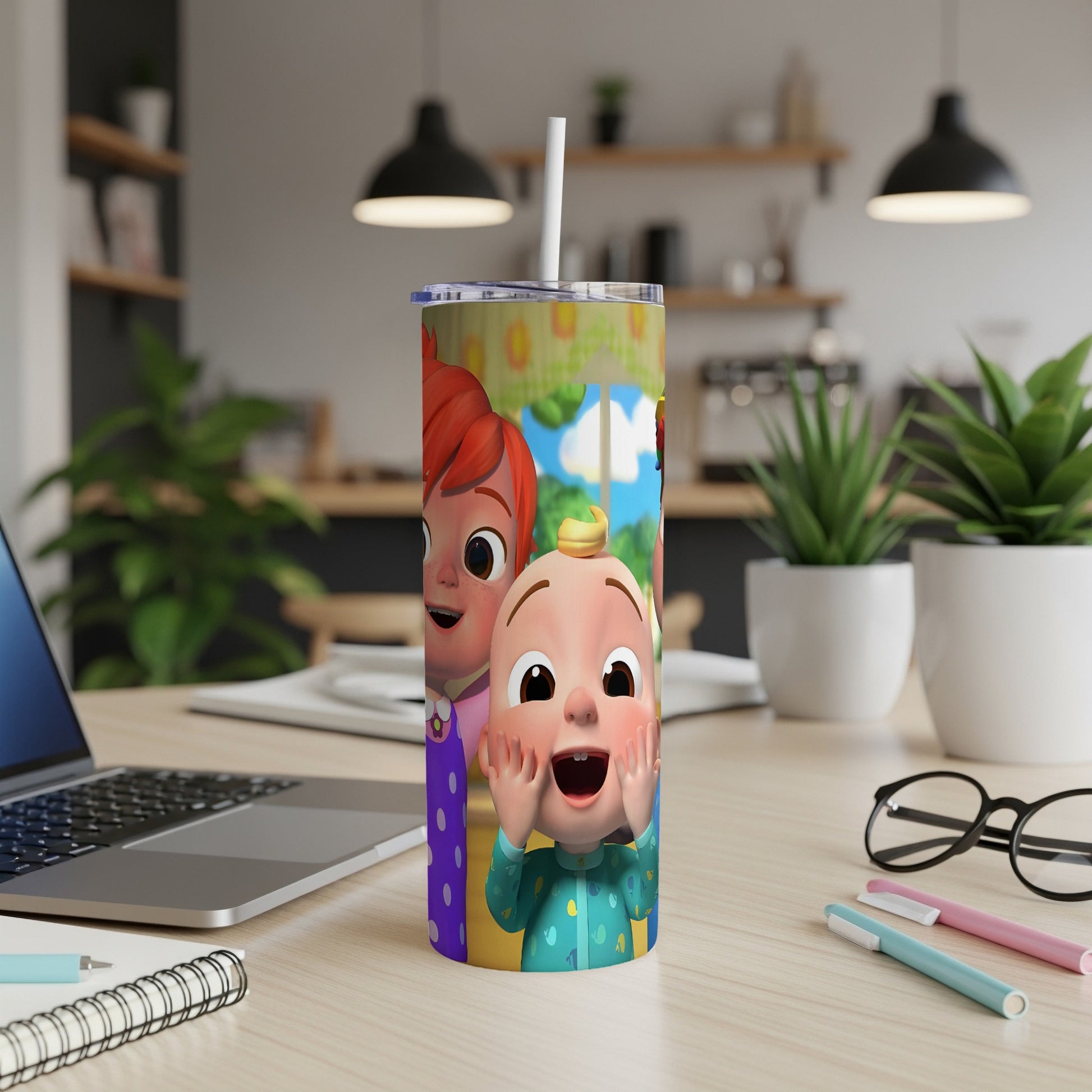 Cocomelon characters JJ and YoYo on a tall tumbler with a straw.