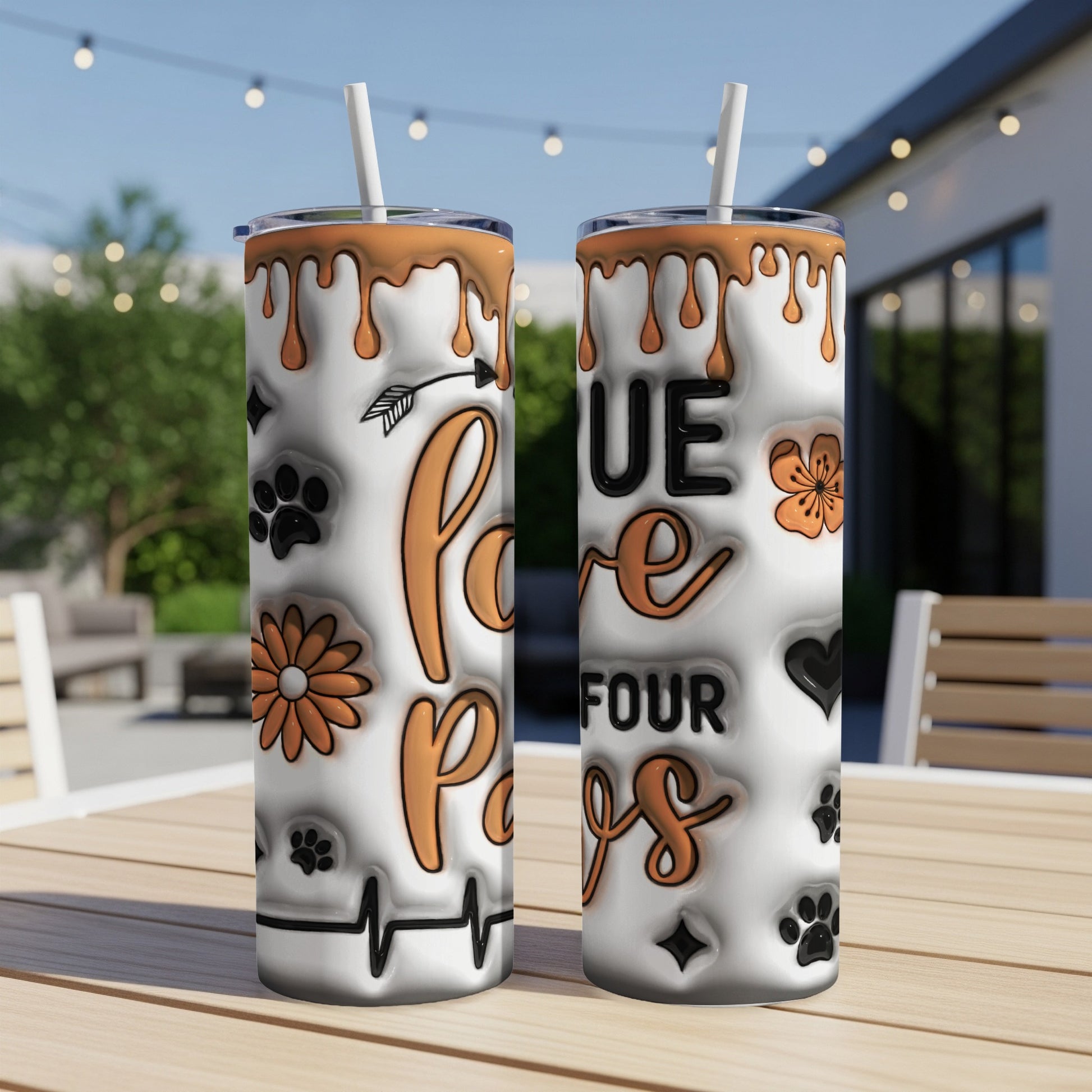 White tumbler with "Love Four Paws" and paw prints design.
