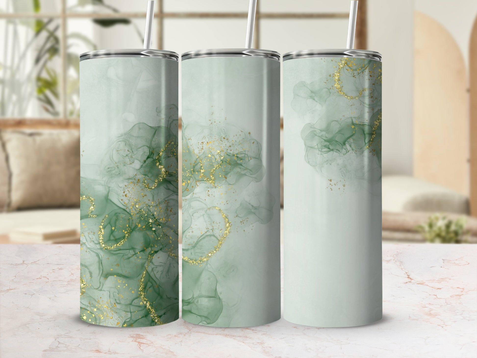Three tumblers with abstract green watercolor and gold glitter design.