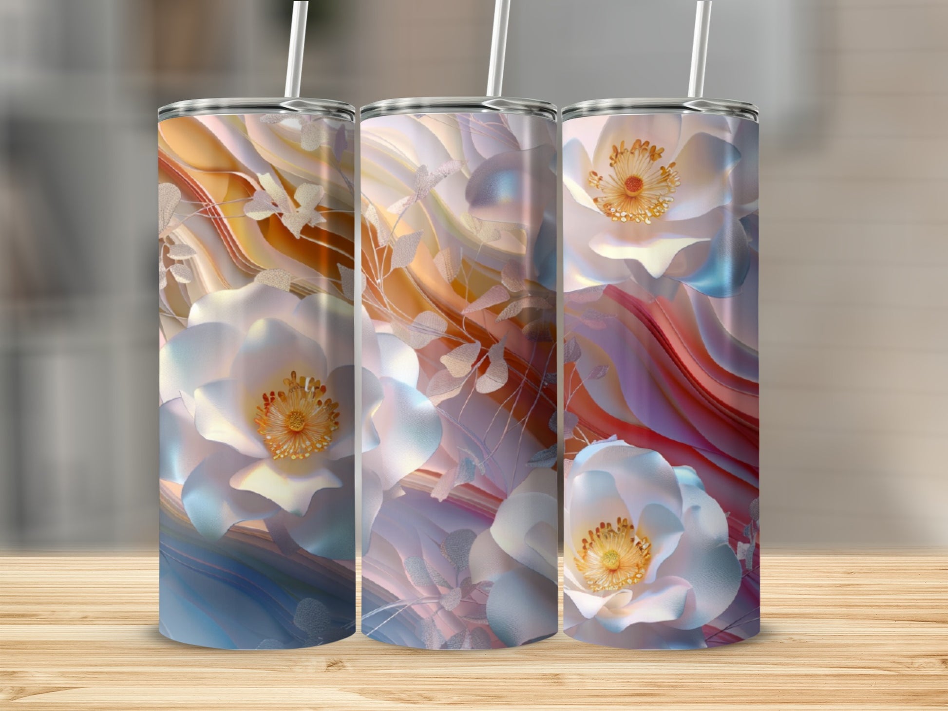 Three floral tumblers with pastel flowers and abstract background.