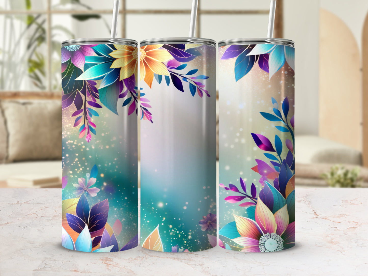 Three tumblers with floral and leaf designs in blue, purple, and gold.