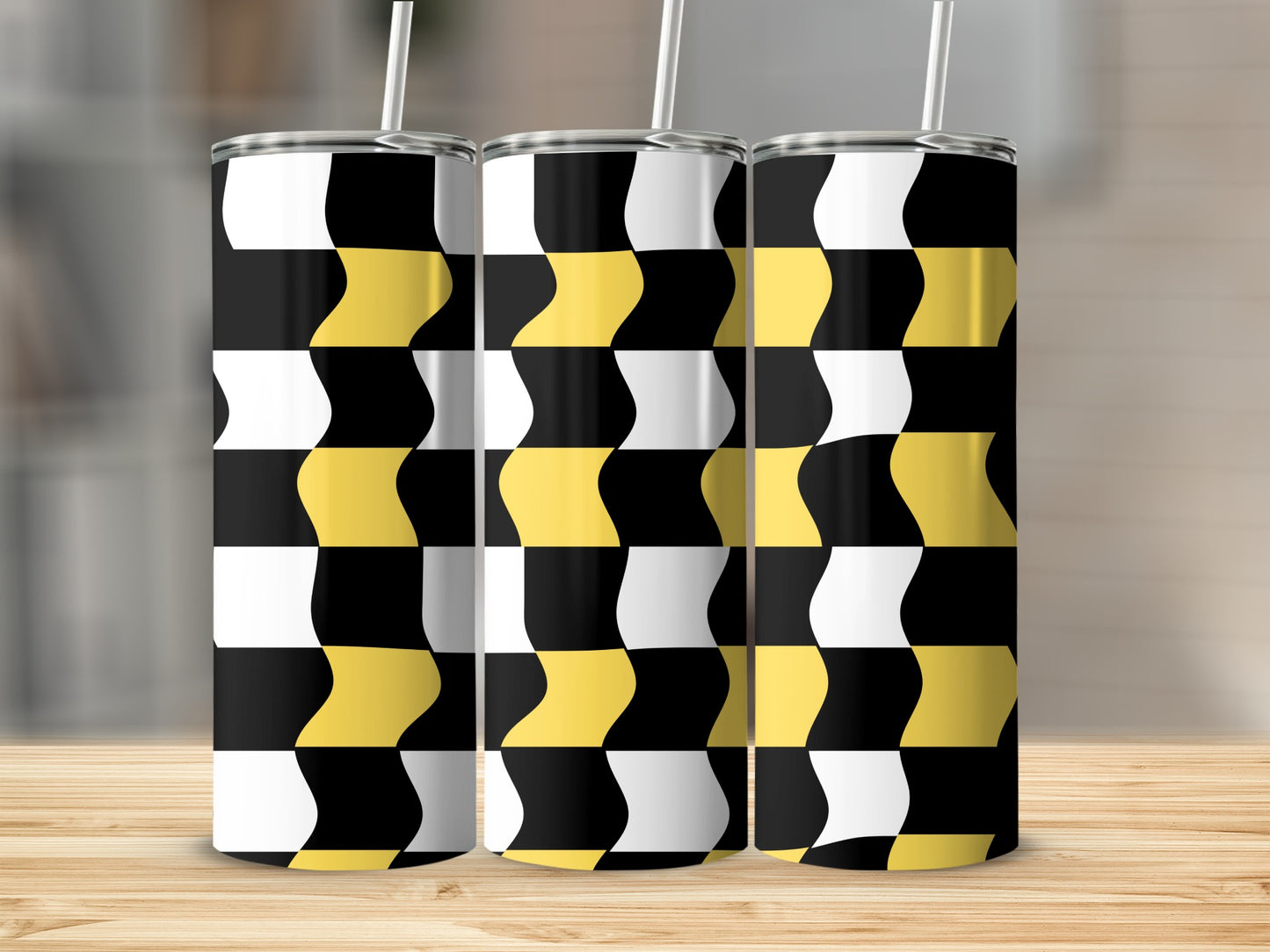 Three tumblers with a black, white, and yellow checkered wave pattern.