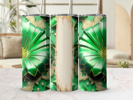 Green and gold patterned tumblers with straws on a marbled surface.