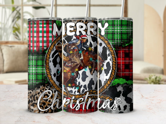 Cowboy riding horse with "Merry Christmas" text on festive tumbler.