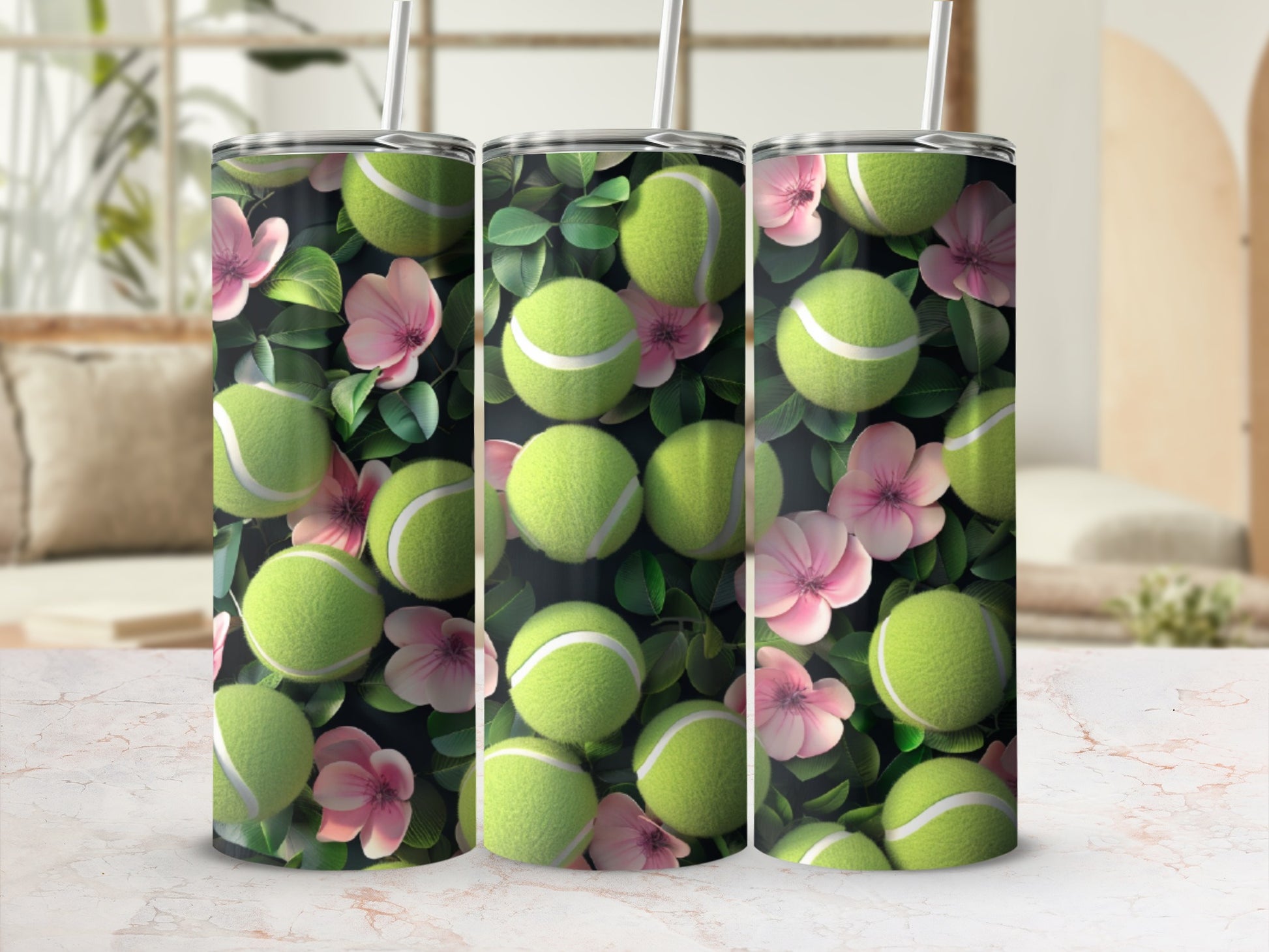 Tumbler with tennis balls and pink flowers pattern.