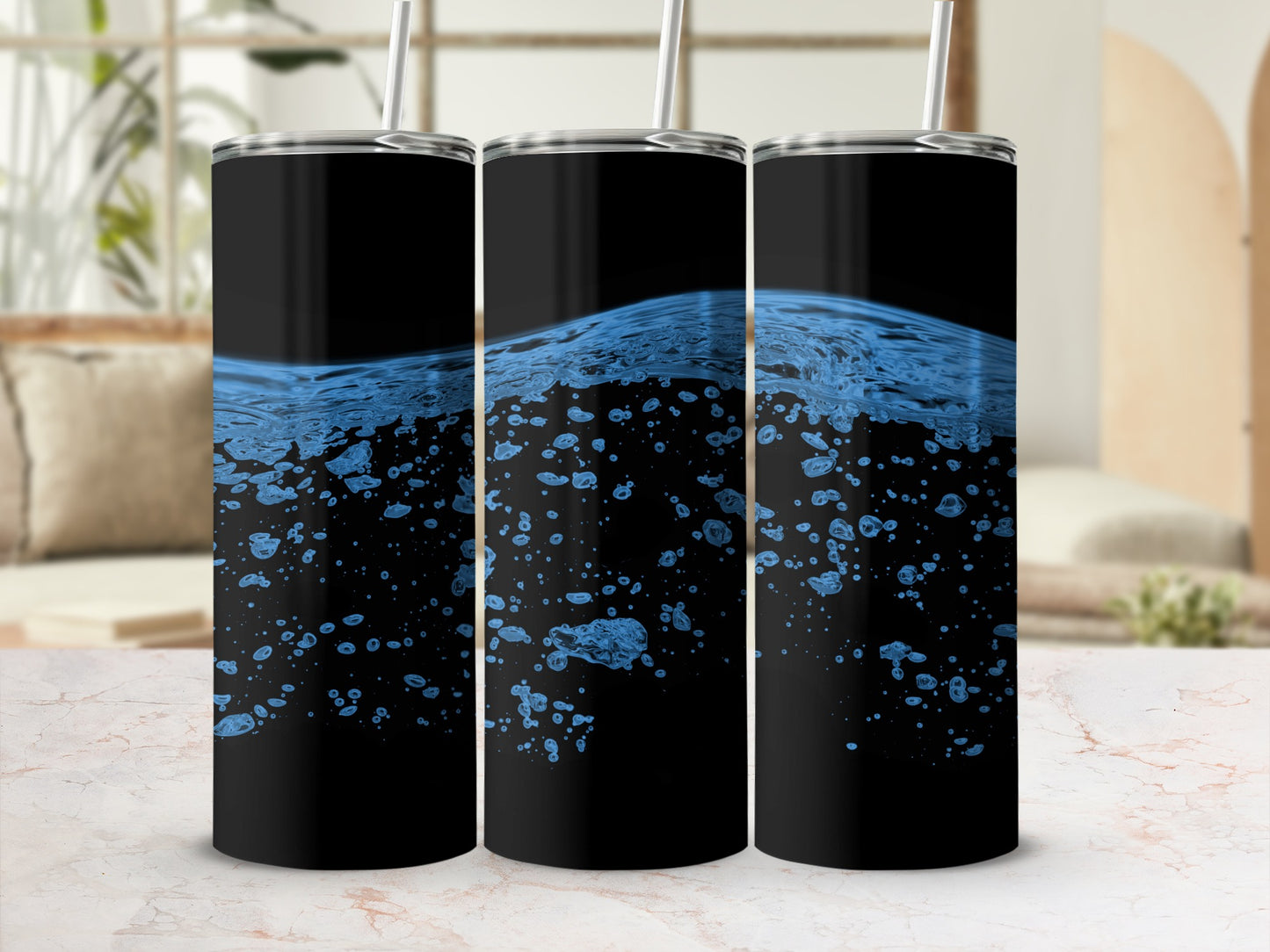 Three black tumblers with a blue wave and bubble design.
