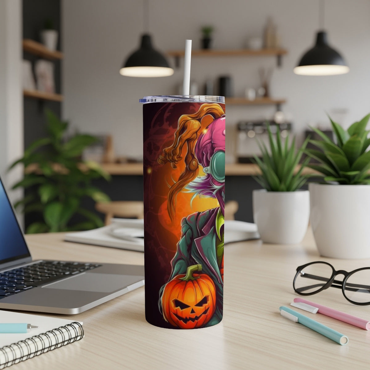 Halloween tumbler with jack-o'-lantern and spooky character art.