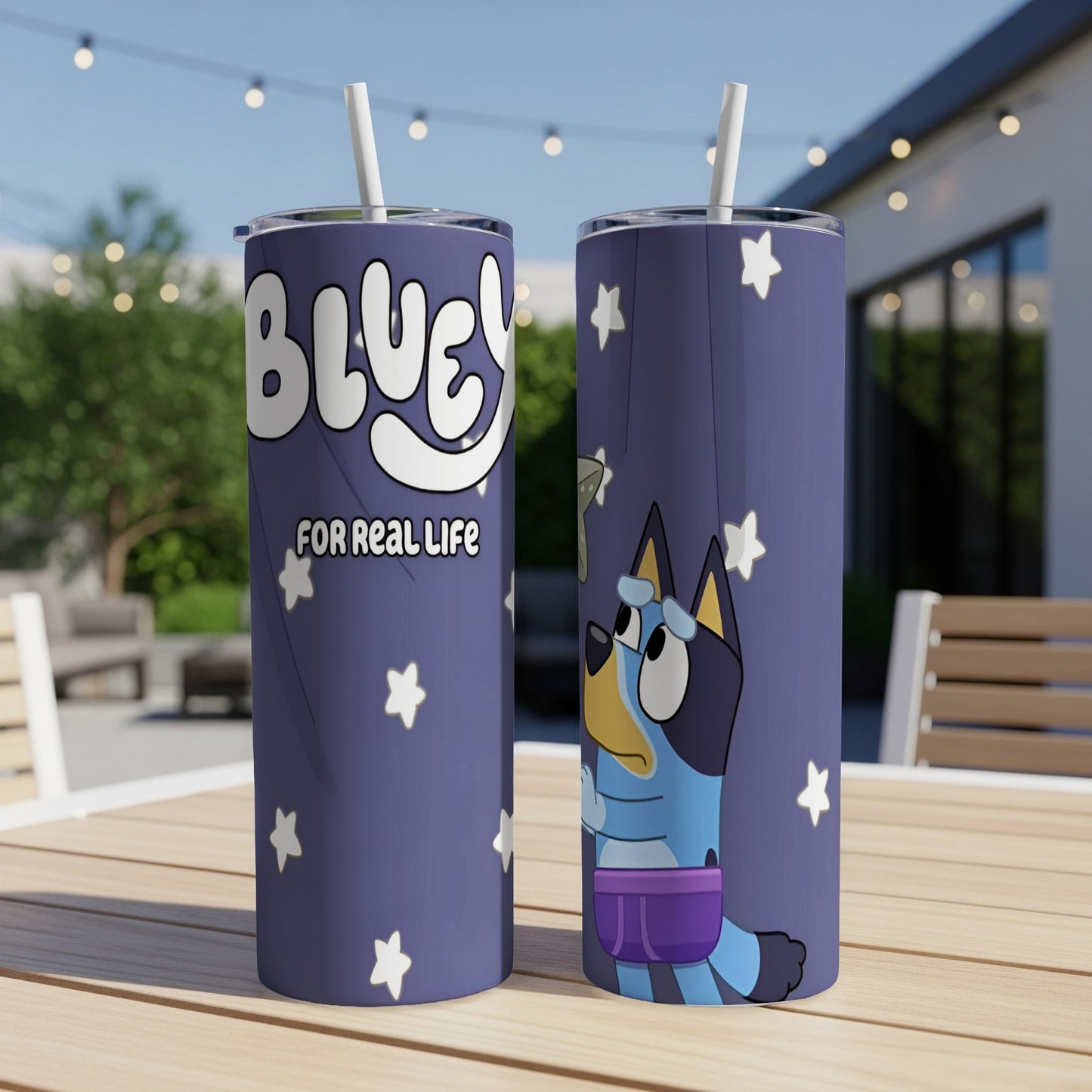 Bluey character tumbler with "Bluey for Real Life" text on a table.
