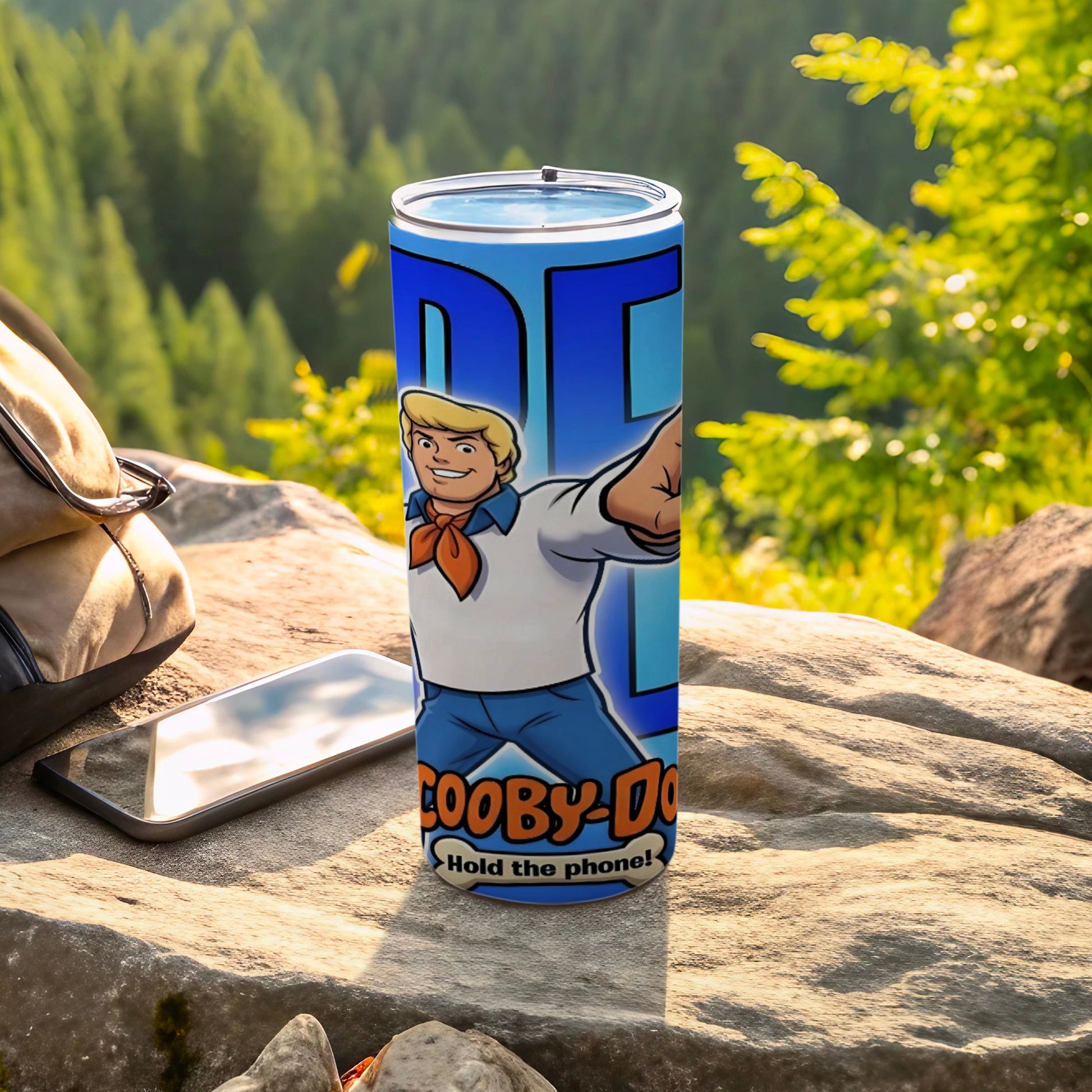 Scooby-Doo tumbler with "Hold the phone!" text and cartoon character.
