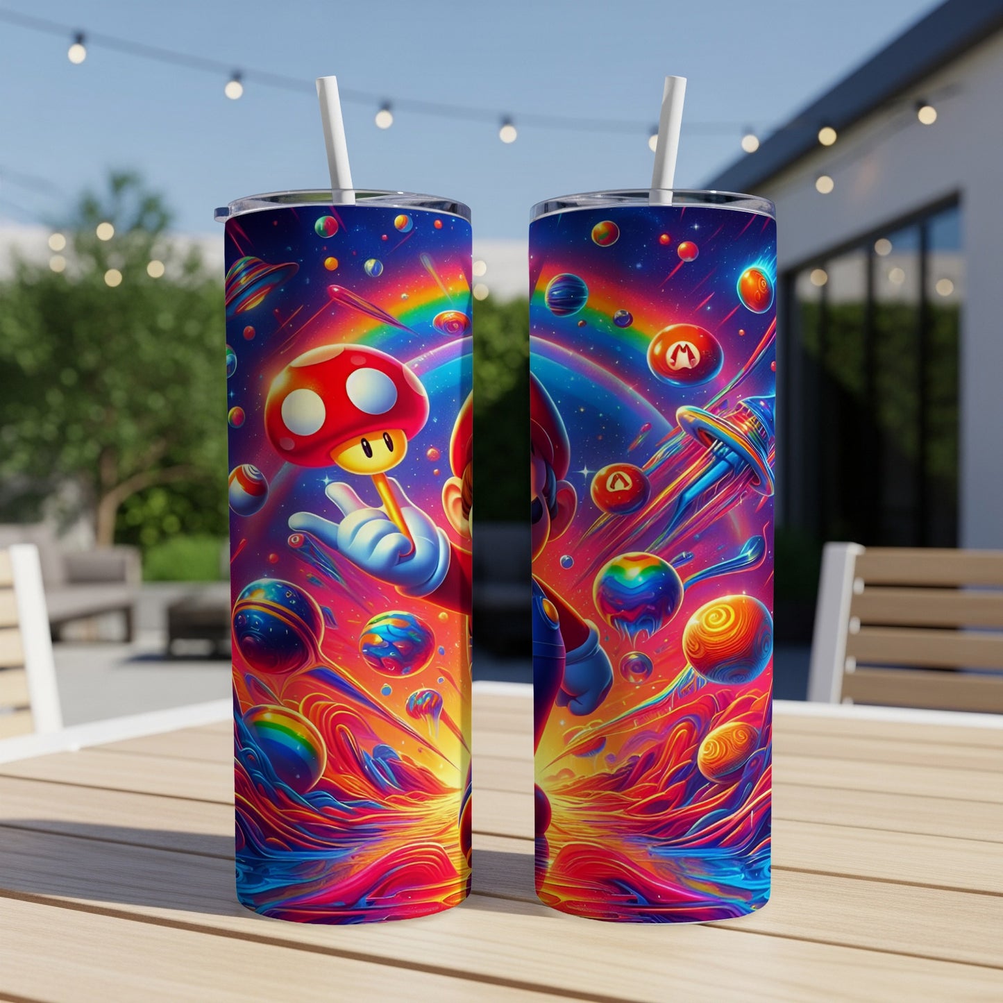 Two colorful, insulated tumblers featuring Super Mario characters and cosmic elements.