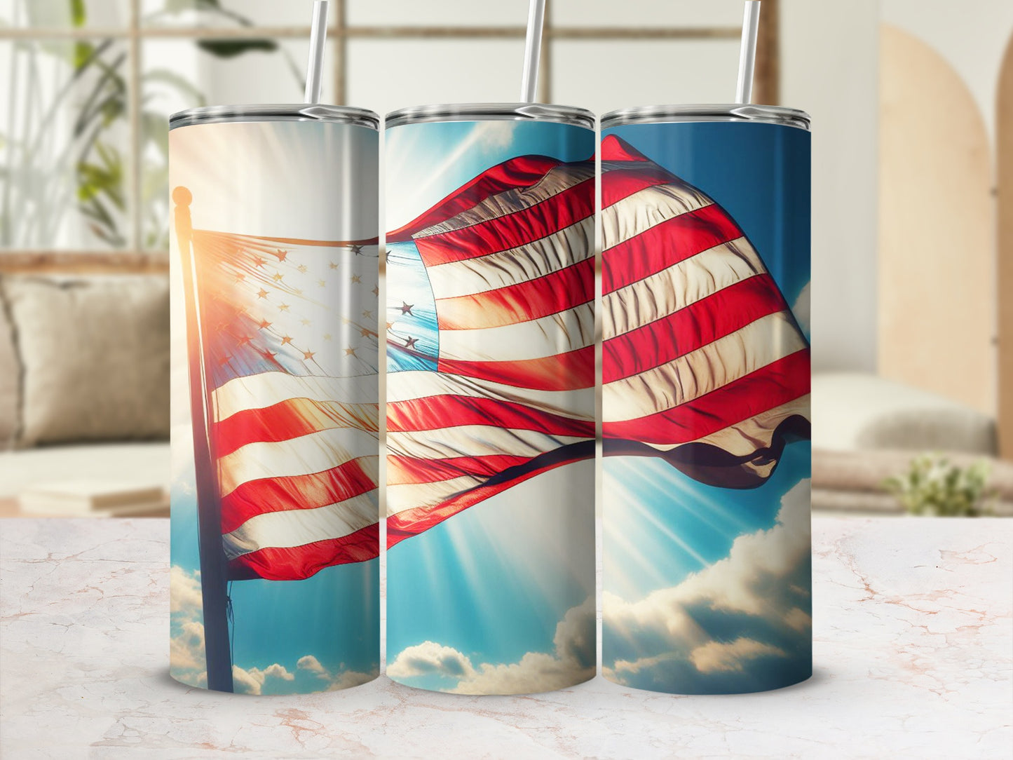 American flag design on three stainless steel tumblers with straws.