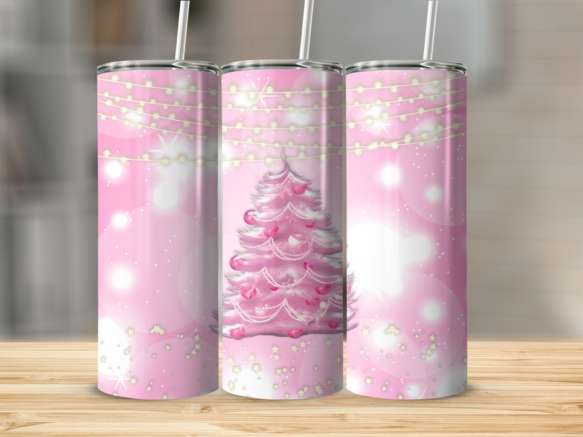 Pink Christmas tree with hearts and lights on a tumbler.