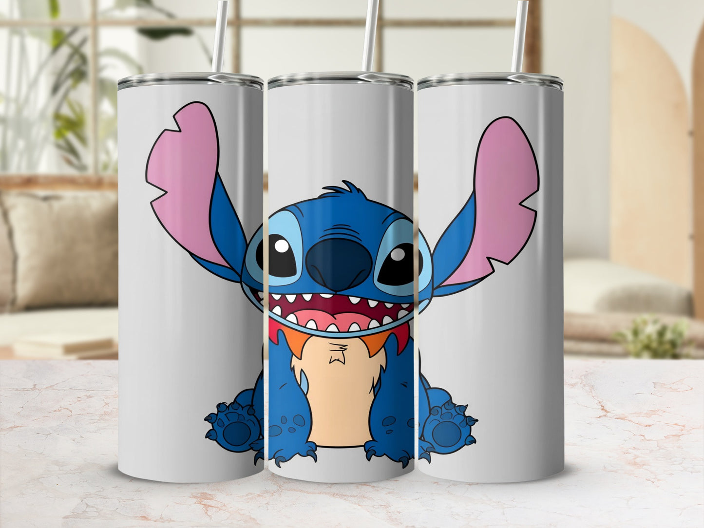 Stitch character on three white tumblers with straws.