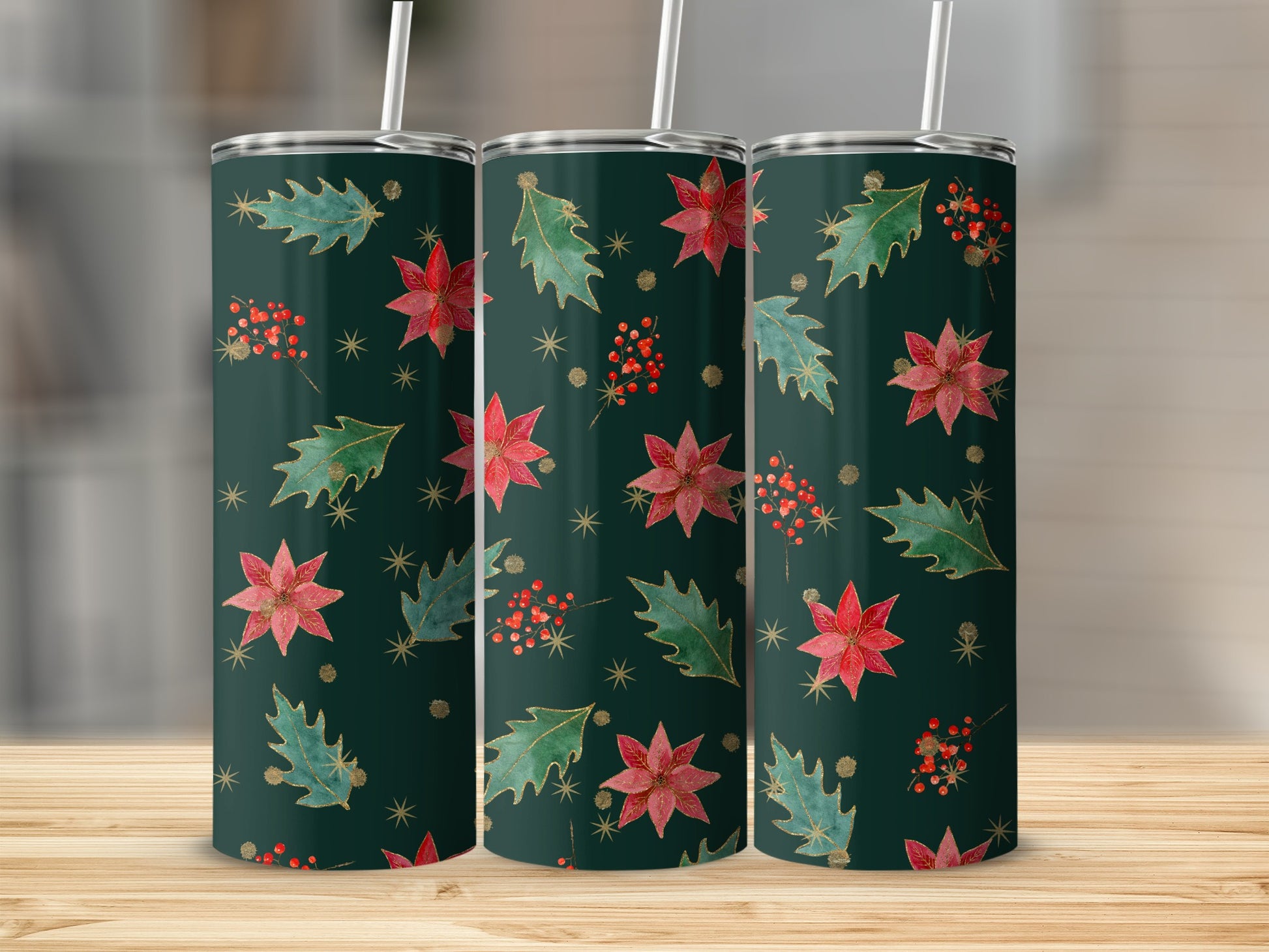 Green tumblers with red poinsettias, green leaves, and gold accents.