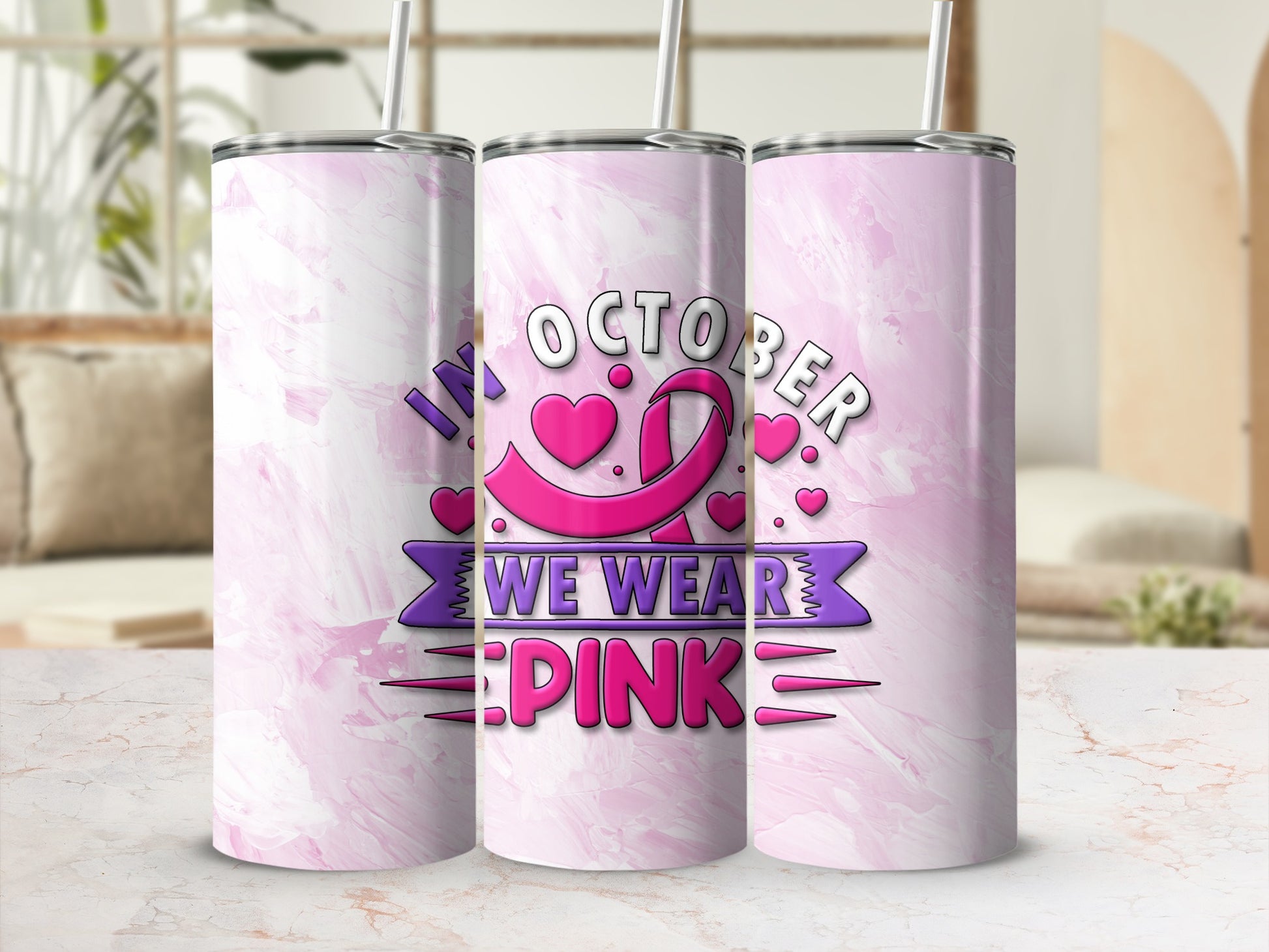 Pink marbled tumbler with "In October We Wear Pink" text and ribbon graphic.