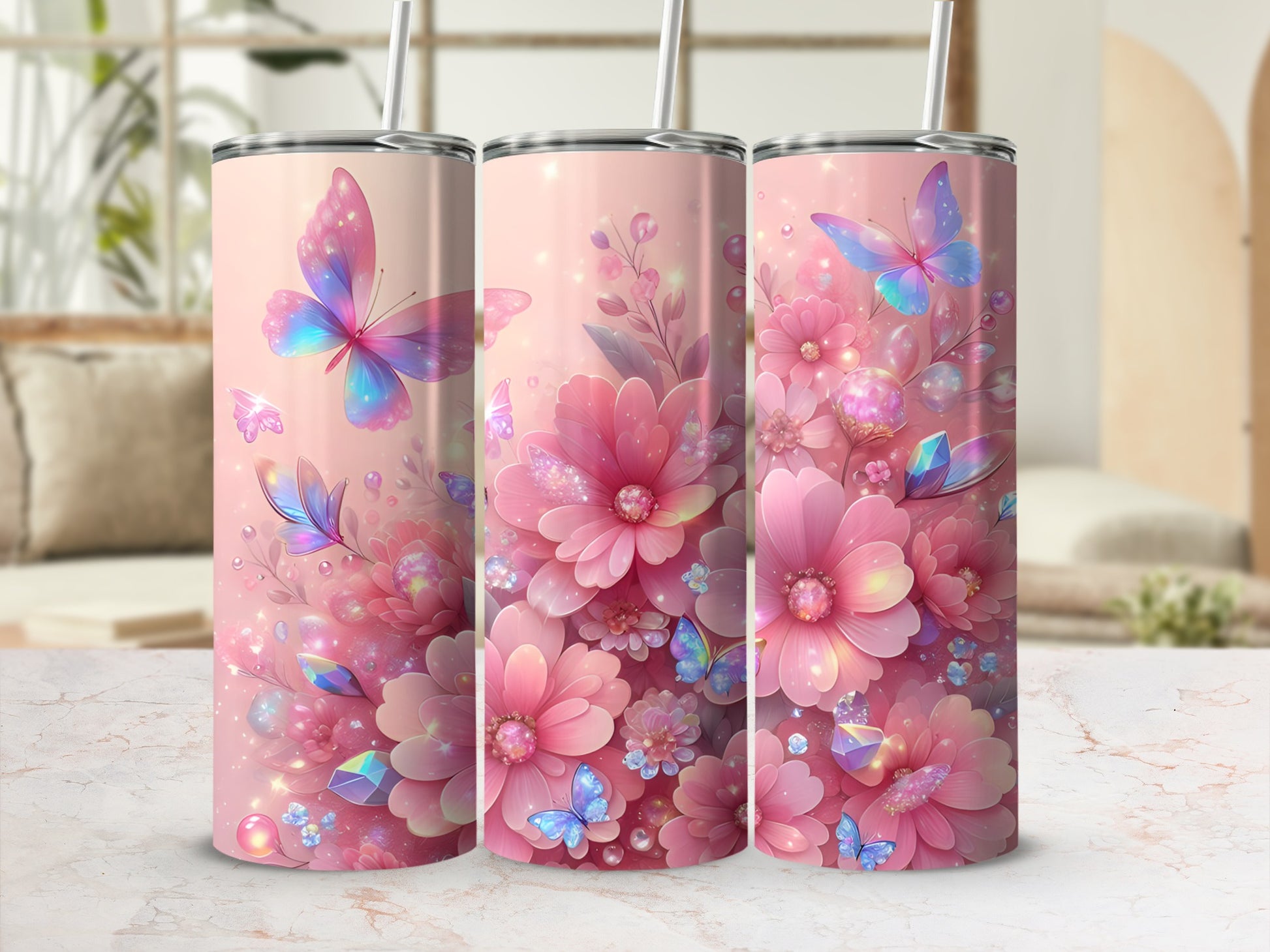 Pink floral and butterfly design on three tumblers.