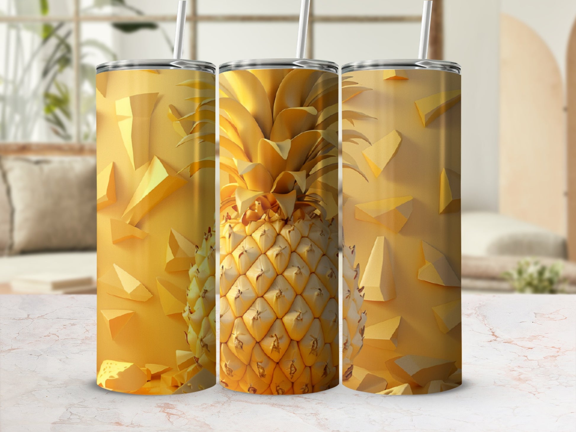 Three golden tumblers with pineapple design and abstract background.