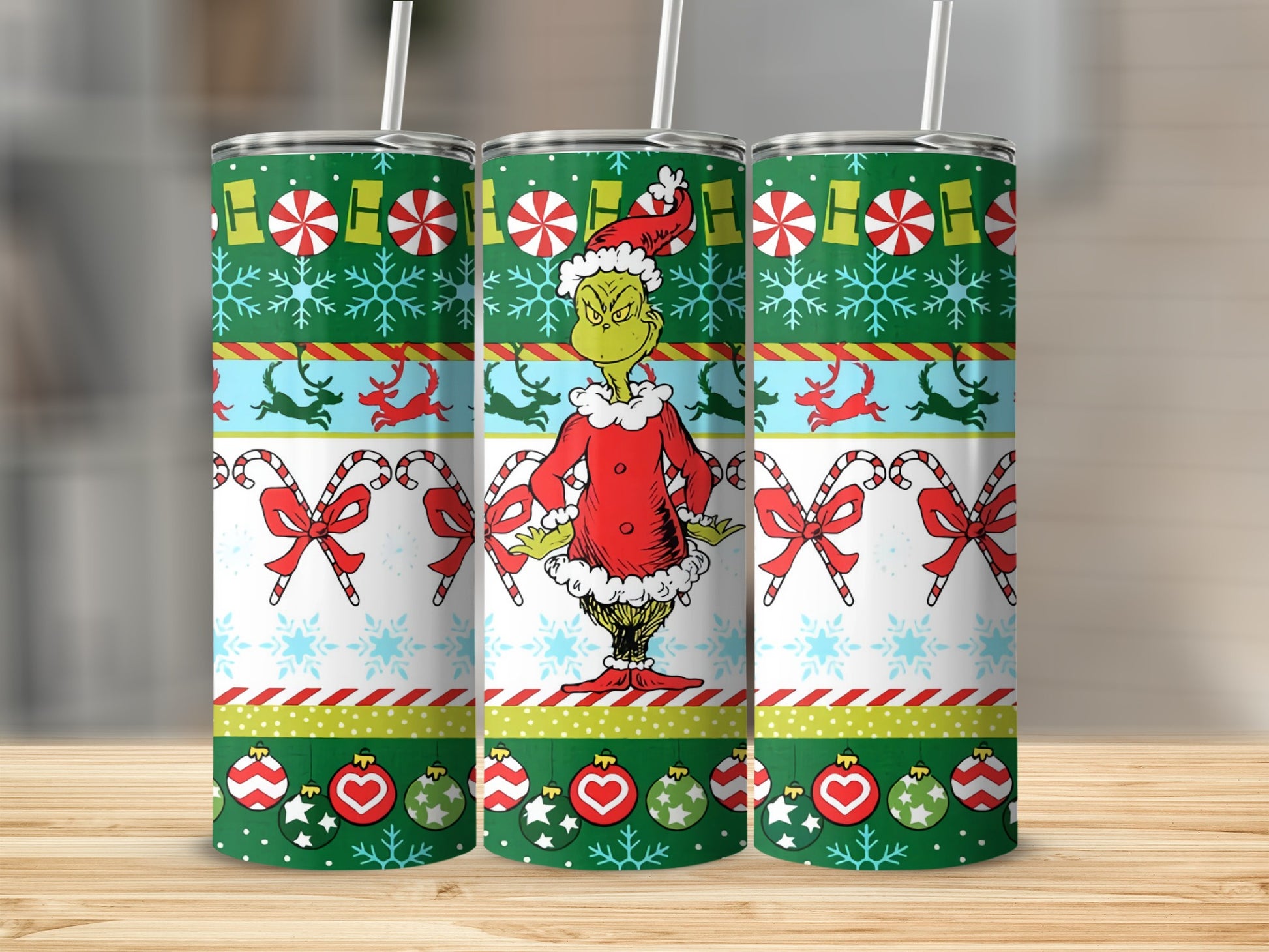 The Grinch in festive holiday pattern on a tumbler.