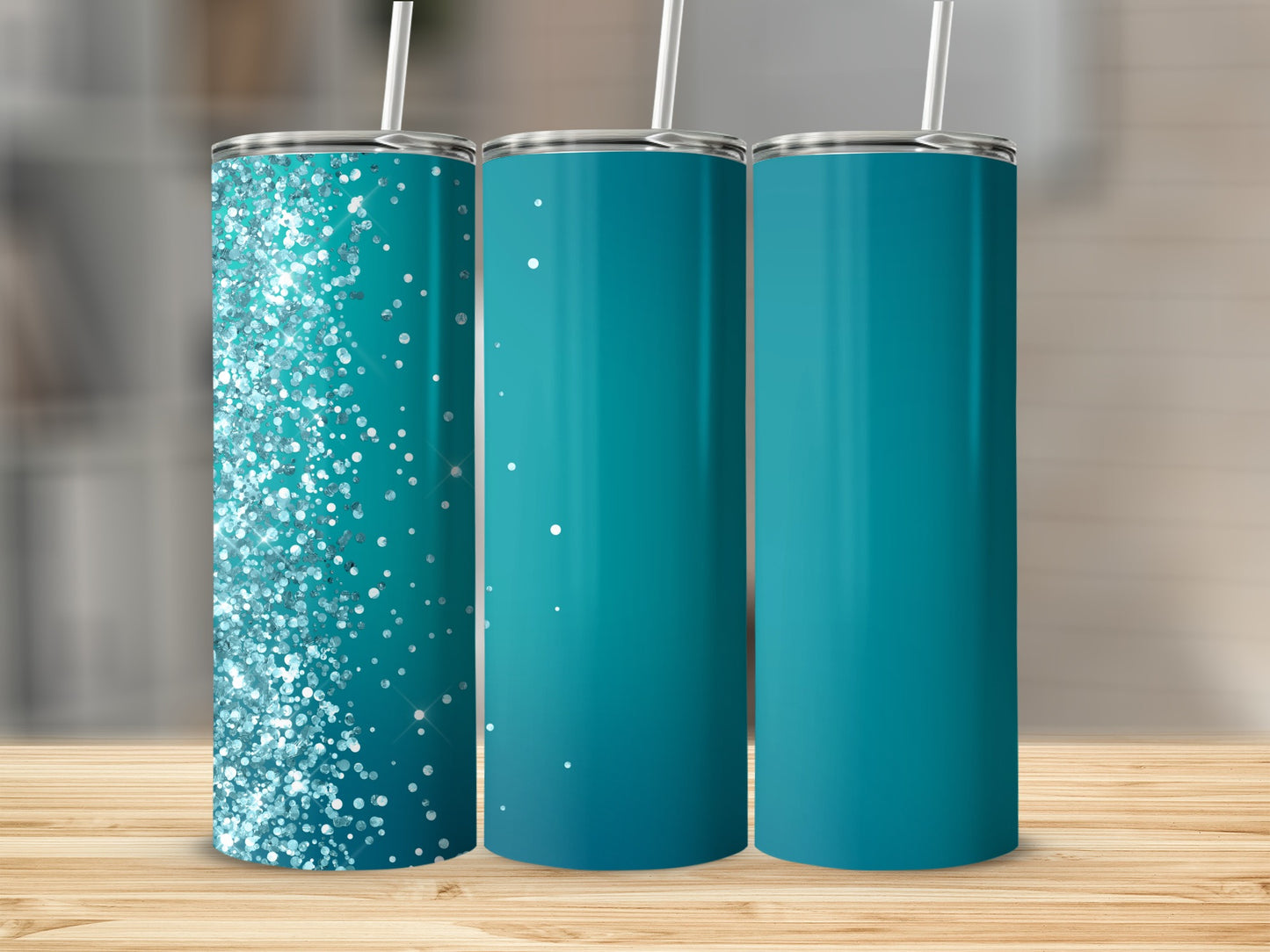Three tumblers with straws, one with glitter, two solid teal.
