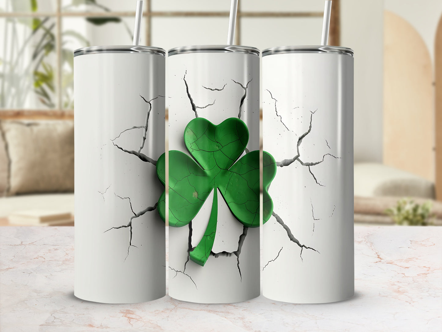 White tumbler with cracked design and a green shamrock.