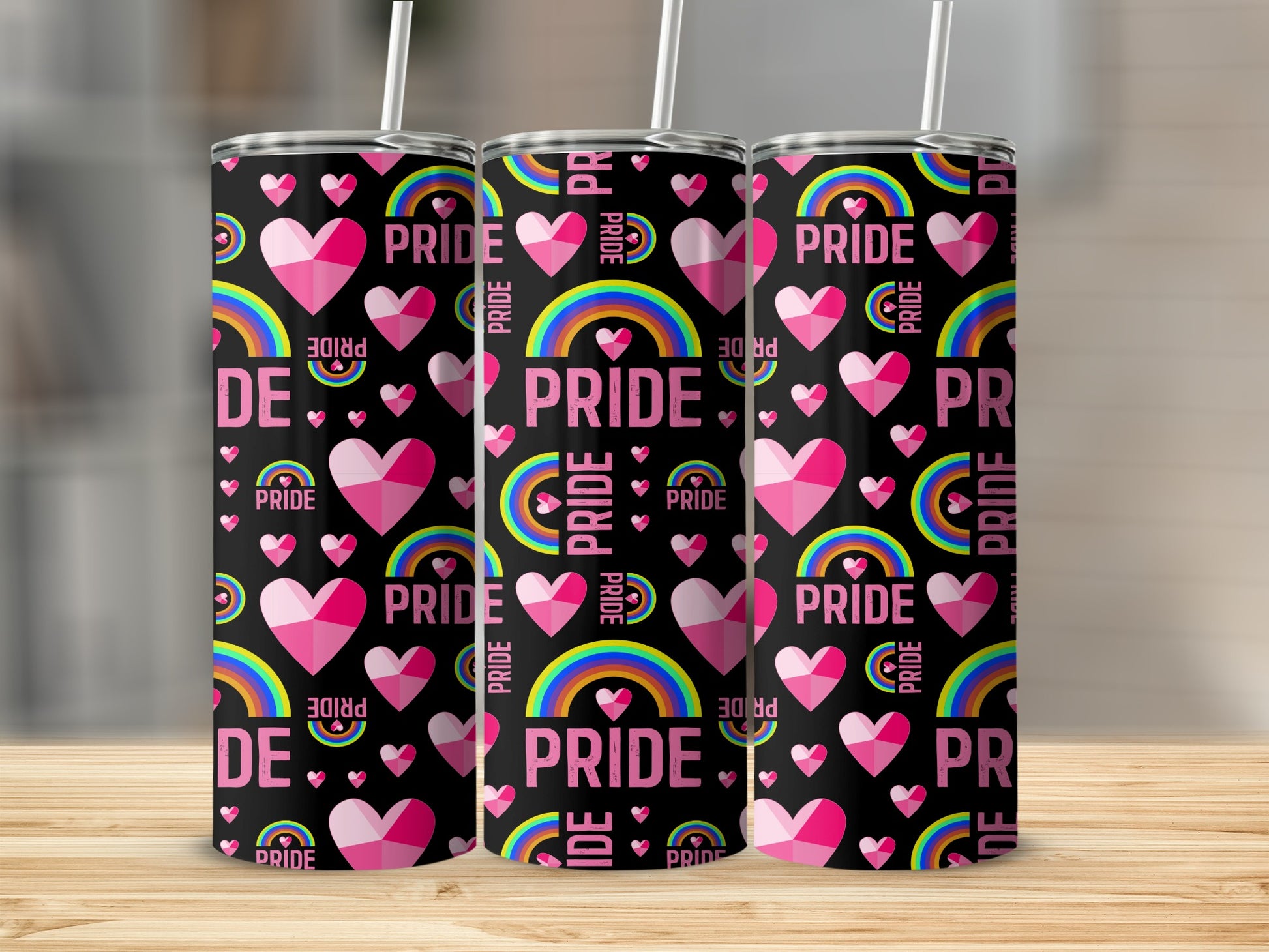 Three tall tumblers with "Pride" text, rainbows, and hearts on black background.
