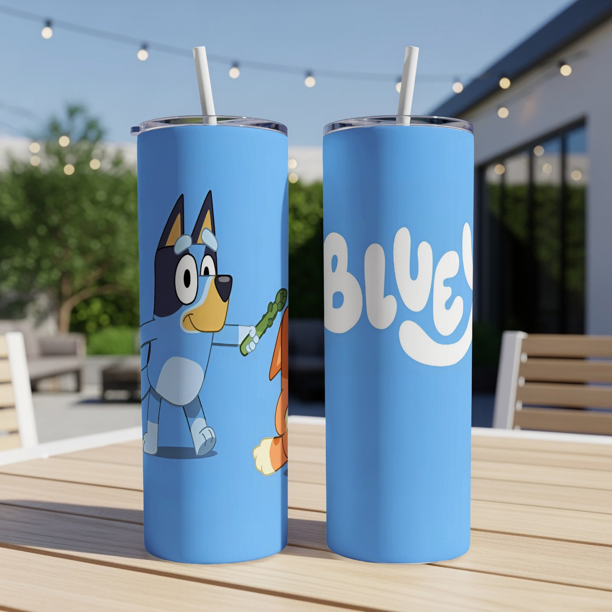Bluey and Bingo Bluey tumbler with straws on a table.