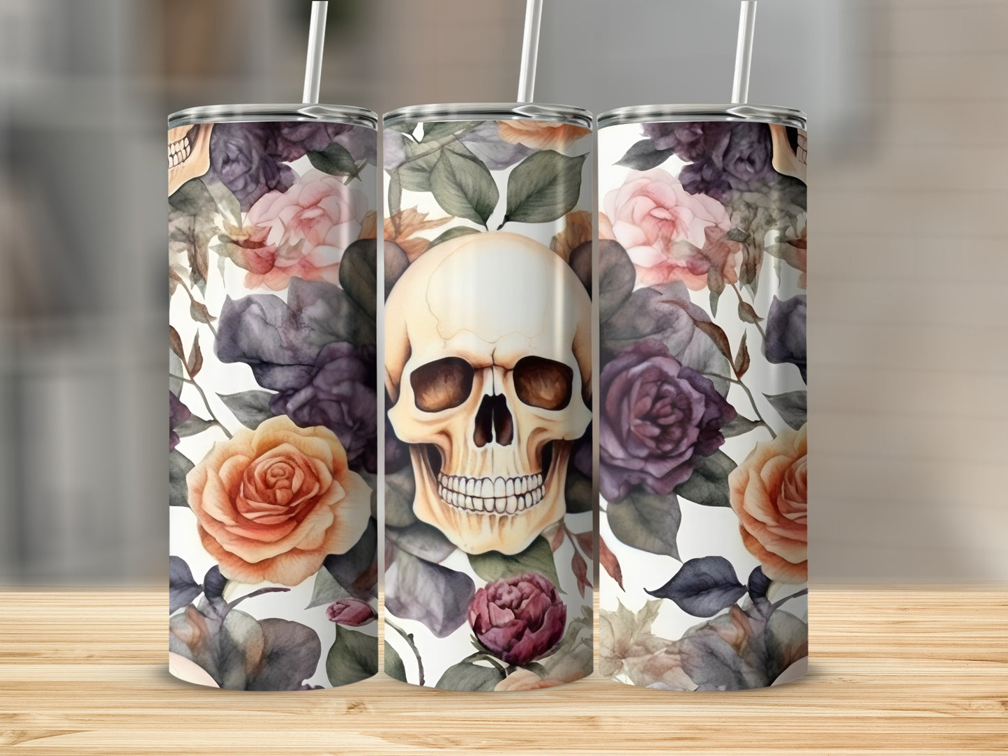 Three tumblers with a skull and floral pattern.