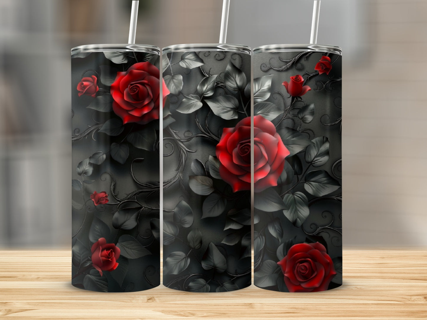 Three tumblers with red roses and black swirling vines design.