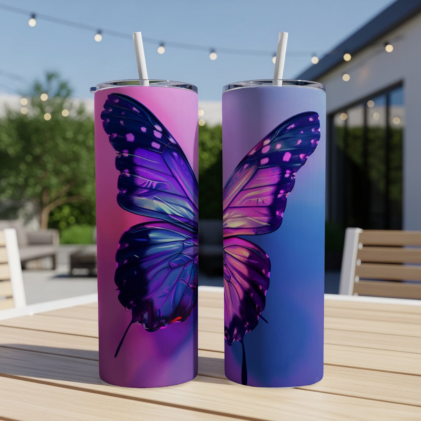 Two tall tumblers with a large purple and blue butterfly wing design.