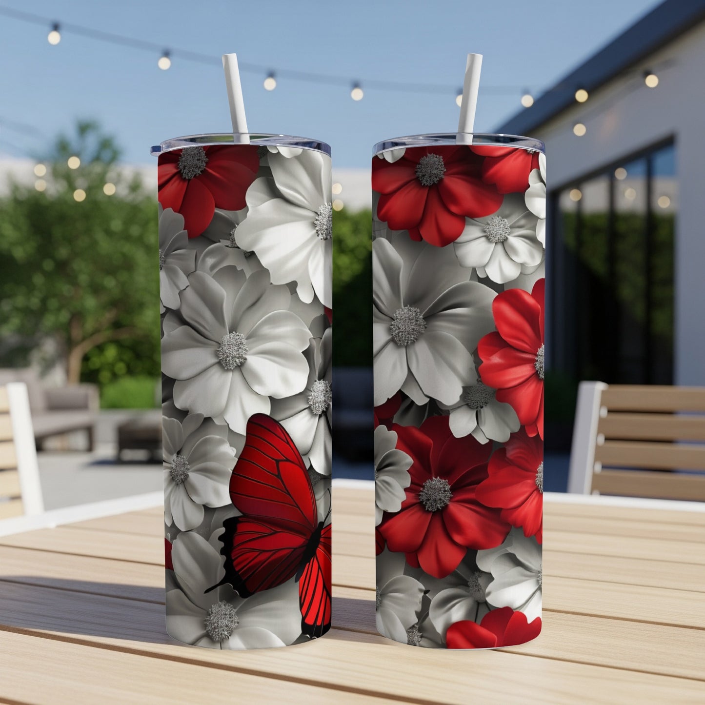 Two tumblers with red and white flowers and a red butterfly design.