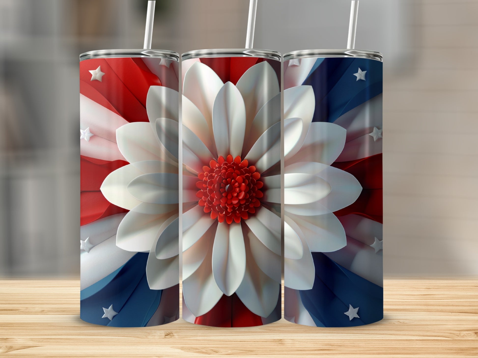 Three patriotic tumblers with floral designs and star accents.