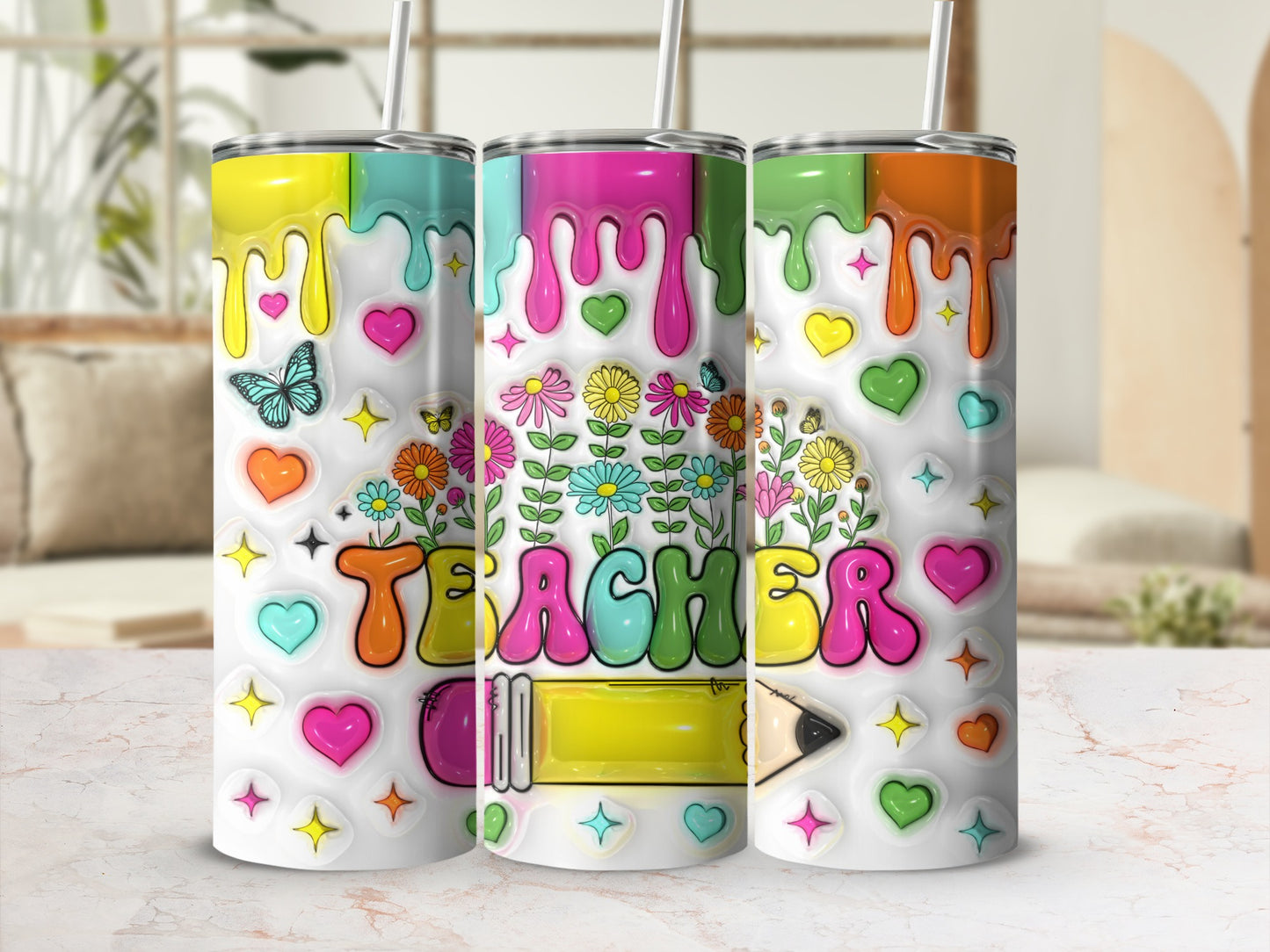 Teacher tumbler with colorful flowers, hearts, butterflies, and dripping paint design.